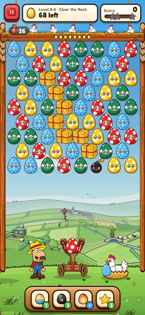 A Piccolino Pop! level: rows of polka-dot eggs and hay bales above the Egg-a-pult.